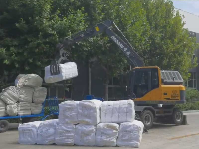 选购宝鼎抓包机，助力企业装卸布料物料