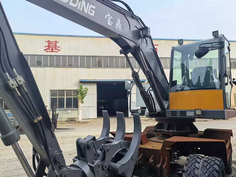 宝鼎110电动抓料机：一年质保，高效省电的可靠之选